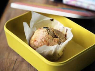 muffin on yellow plastic container